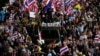 Thousands of anti-government protesters march in Bangkok, Thailand, Nov. 27, 2013. 