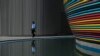 A man walks through the venue for the COP28 UN Climate Change Conference in Dubai, United Arab Emirates, Nov. 30, 2023.