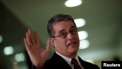 Roberto Azevedo, directeur général de l'Organisation mondiale du commerce (OMC), lors d'une conférence de presse à Brasilia, Brésil le 12 mars 2018. REUTERS / Ueslei Marcelino - RC112C936F20