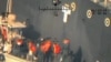 U.S. Pentagon in Washington releases handout imagery that it says shows damage from Iranian mines to commercial ships in Gulf of Oman