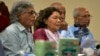 Pakistani human rights activist Nasreen Azhar, second left, addresses the audience at a launching ceremony for the report, 'State of Human Rights in 2018,' in Islamabad, April 15, 2019.