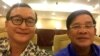 នេះជា​រូប​ដែល​ត្រូ​វ​បាន​គេ​ចែក​ចាយ​ពេញ​ប្រព័ន្ធ​សង្គម​ក្នុង​ប្រទេស​កម្ពុជា​ ដែល​បង្ហាញ​ពី មេដឹកនាំ​ គណបក្ស​ប្រឆាំង​លោក​សម​ រង្ស៊ីនិង​ នាយក​រដ្ឋមន្រ្តី​ហ៊ុន សែនបាន​ថត​រូប​ជា​មួយ​គ្នា​ដើម្បី​បង្ហាញ​ពី វប្បធម៌បន្ទាប់​ពី កិច្ច​ពិភាក្សារវាង​គ្រួសារ​ទាំង​ពីរ​នៅសណ្ឋាគារ​ Cambodiana ទី​ក្រុង​ភ្នំ​ពេញ​ប្រទេស​កម្ពុជា។