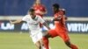Mariano Diaz du Real Madrid, à gauche, et Serge Aurier du PSG, à Columbus, Ohio, le 27 juillet 2016.