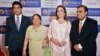 FILE - Mukesh Ambani (R), chairman of Reliance Industries Ltd, poses with his wife Nita (2nd R), mother Kokilaben (2nd L) and son Akash, before addressing the company's annual shareholders' meeting in Mumbai.