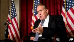 FILE - Former Senate Majority Leader Bob Dole speaks after being presented with the McGovern-Dole Leadership Award on Capitol Hill in Washington, Dec. 11, 2013.
