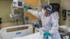 A medical worker at the US Department of Veterans Affairs (VA) Boston Healthcare system campus and medical center in West Roxbury, Massachusetts on January 11, 2022. 
