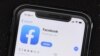FILE - The Facebook social media app is displayed on an Apple's App Store, July 30, 2019. 