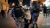FILE - Riot police detain a demonstrator during a protest against mobilization in Moscow, Russia, Sept. 21, 2022. 