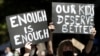 Thousands of people with placards and banners rally demanding justice for women in Sydney, March 15, 2021, as the government reels from two separate allegations.