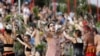 FILE - An Aboriginal dance troupe performs at Australia Day celebrations in Sydney, Australia, Jan. 26, 2020. 