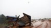 A military helicopter flies during the flood after the Xe Pian-Xe Namnoy hydropower dam collapsed in Attapeu province, Laos, July 26, 2018.