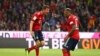 Thomas Mueller , à gauche, et Jerome Boateng du Bayern Munich jubilent après un but , Allemagne, le 24 août 2018.