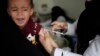 A boy reacts as he receives a diphtheria vaccine at a hospital in Sanaa, Yemen, Sept. 9, 2019. 