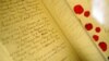 FILE - The original document of the 1st Geneva Convention "for the Amelioration of the Condition of the Wounded in Armies in the Field" signed in 1864 is seen at the International Red Cross and Red Crescent Museum in Geneva, Switzerland.