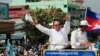 FILE - In this June 2, 2017, file photo, opposition party Cambodia National Rescue Party (CNRP) leader Kem Sokha greets his supporters at a rally in Phnom Penh, Cambodia. 