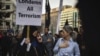 FILE - American Shi'ite Muslims march to the White House to protest against the Islamic State group, in Washington, D.C., Dec. 6, 2015. 