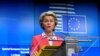 European Commission President Ursula von der Leyen addresses the media on the second day of a European Union leaders summit at the Europa building in Brussels, Belgium, Oct. 2, 2020.