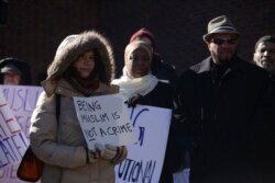 FILE - Muslims and their supporters participate in a rally for Muslim rights outside of the James A. Byrne Federal Courthouse in Philadelphia, Jan. 13, 2015.