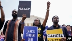 FILE - Students demonstrate about student loan debt outside the Supreme Court, June 30, 2023, in Washington. 