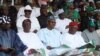 FILE - Muhammadu Buhari, former military ruler and presidential aspirant, center, and other party leaders attends the All Progressive Congress party (APC) convention in Lagos, Nigeria, April 18, 2013.