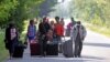 Three families, who said they were from Burundi, head to Canada to seek asylum, Aug. 3, 2017, Thousands of immigrants, awaiting the outcome of their US asylum application but fearing deportation under President Donald Trump, made the journey to Canada. 