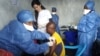 This handout picture released by Doctors Without Borders (MSF) Nov. 14, 2019, shows a man receiving his first injection of the new Ebola vaccine, at the MSF facilities in Goma, North Kivu province, DRC.
