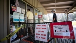 Social distancing signs are pictured at Eaton Canyon Golf Course, which re-opened today, during the outbreak of the coronavirus disease (COVID-19), in Pasadena, California, U.S., May 9, 2020.