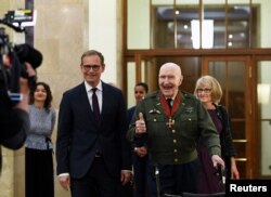 Berlin's Major Michael Mueller welcomes Gail Halverson, Airlift veteran and Raisin Bomber pilot, during the 70th anniversary of the end of the Berlin Blockade, in Berlin, Germany, May 10, 2019.