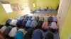 FILE – In this Sept. 23, 2016, photo, Muslim worshippers pray during a service at the Bernards Township Community Center in Basking Ridge, New Jersey.
