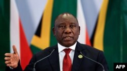 Le président sud-africain, Cyril Ramaphosa, lors d'une conférence de presse à l'issue du sommet des BRICS à Johannesburg, le 27 juillet 2018. AFP PHOTO / POOL / Themba Hadebe