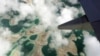 Lagoons can be seen from a plane as it flies above Kiritimati Island, part of the Pacific Island nation of Kiribati, April 5, 2016.