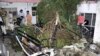 FILE - Afghans inspect damage to the Ahmadi family house after a U.S. drone strike in Kabul, Afghanistan, Aug. 29, 2021. 