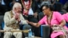 Britain's King Charles and CHOGM Secretary General Patricia Scotland talk during the opening ceremony for the Commonwealth Heads of Government meeting in Apia, Samoa, Oct. 25, 2024.