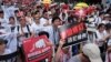 Many protesters call for Chief Executive Carrie Lam’s resignation in Hong Kong, June 9, 2019, at a demonstration against extradition to China. 