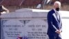 President Joe Biden walks away after a wreath laying at the tomb of the Rev. Martin Luther King Jr., and his wife, Coretta Scott King, Jan. 11, 2022, in Atlanta, Georgia.