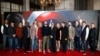 Cast and crew members of the film pose for photographers at a media event ahead of the release of "Captain America: Civil War" in London, April 25, 2016. 