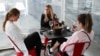 Customers sit at a restaurant on the first day of eased New South Wales coronavirus disease (COVID-19) restrictions, allowing up to 10 patrons to sit at a time inside establishments previously only open for take-away, in Sydney, Australia, May 15, 2020.