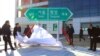 FILE - South and North Korean officials unveil a direction signboard for Seoul and Pyongyang during a groundbreaking ceremony for reconnecting roads on December 26, 2018. North Korea has blown up sections of the roads that connect it to the South on Oct. 15, 2024.