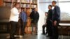 Paul F. Cummins, educator and founder of Coalition for Education, chats with alumni of the organization's programs.