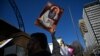 FILE - Pro-life and pro-choice advocates hold a protest rally outside the New South Wales Parliament in Sydney on Aug. 6, 2019.