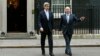 U.S. Secretary of State John Kerry (L) and Britain's Foreign Secretary William Hague leave Number 10 Downing Street in London, February 25, 2013. 
