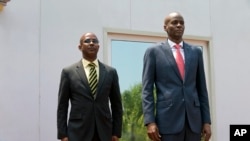 Prezidan ayisyen Jovenel Moise ak Premye minis nome a Jean Michel Lapin, nan Palè Nasyonal, 21 mas 2019.