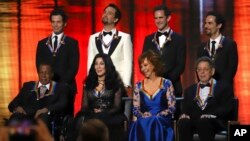 2018 Kennedy Center honorees, front row from left, Wayne Shorter, Cher, Reba McEntire and Philip Glass; back row from left, the co-creators of "Hamilton," Thomas Kail, Lin-Manuel Miranda, Andy Blankenbuehler and Alex Lacamoire.