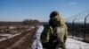 Ukrainian frontier guards patrol an area along the Ukrainian-Russian border in the Kharkiv region, Ukraine Feb. 23, 2022.