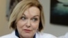 FILE - Leader of the New Zealand opposition National Party Judith Collins speaks prior to entering a salmon factory in Christchurch, N.Z., July 30, 2020.