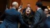 Australian Senator Lidia Thorpe stages a protest as Britain's King Charles and Queen Camilla attend a Parliamentary reception in Canberra, Australia, October 21, 2024.