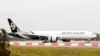 FILE - An Air New Zealand Boeing 777-300ER plane taxis after landing at Kingsford Smith International Airport in Sydney, Australia, Feb. 22, 2018.
