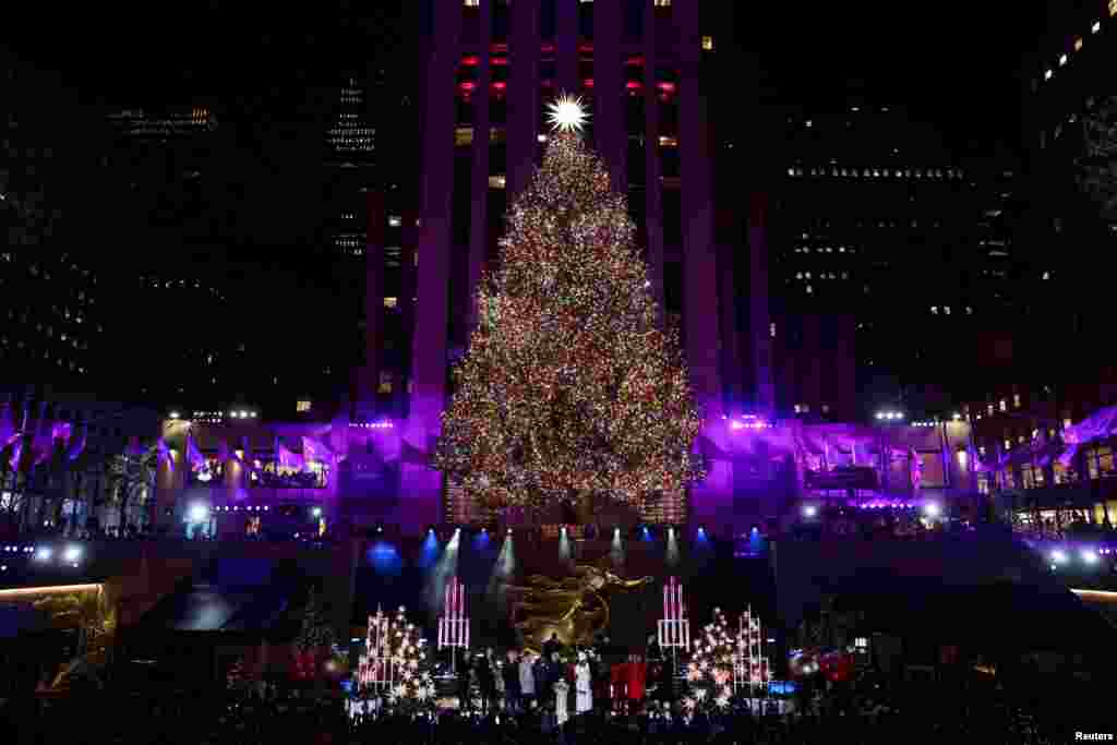 The Christmas tree is lit during the 2024 Rockefeller Center Christmas Tree lighting ceremony in Manhattan in New York City, Dec. 4, 2024. 