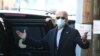 U.S. President-elect Joe Biden reacts to a journalist's question while exiting The Queen theatre following a virtual meeting with frontline health care workers in Wilmington, Delaware, Nov. 18, 2020.