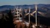  The blades of wind turbines catch the breeze at the Saddleback Ridge wind farm in Carthage, Maine, March 19, 2019.